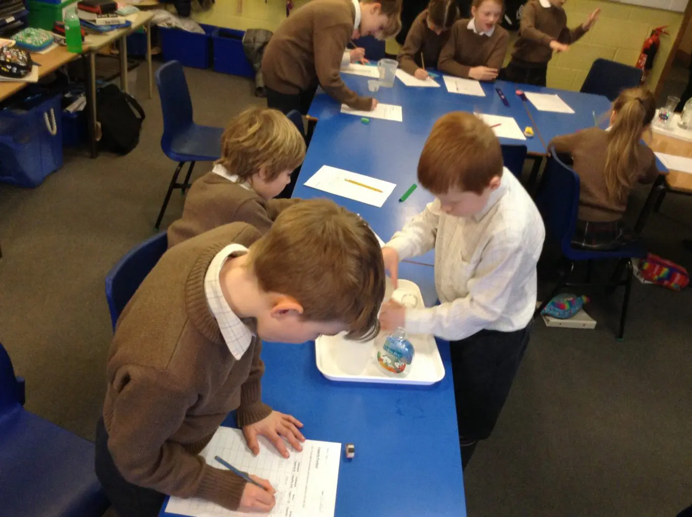 Image of younger students learning Maths