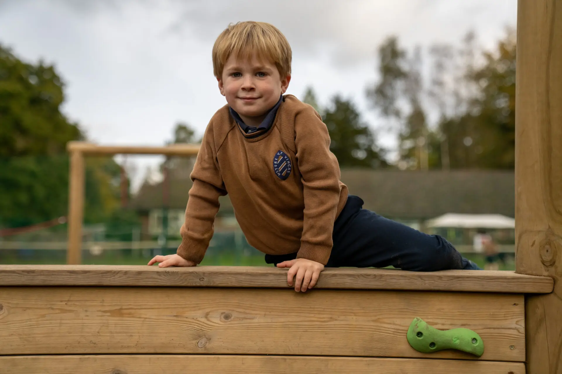 a young school boy playing